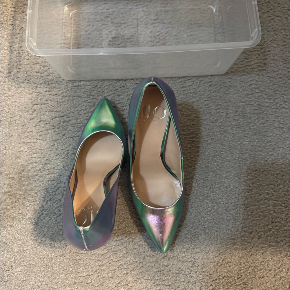 Size 6.5 JLo heels. Worn one. Chrome multi color finish